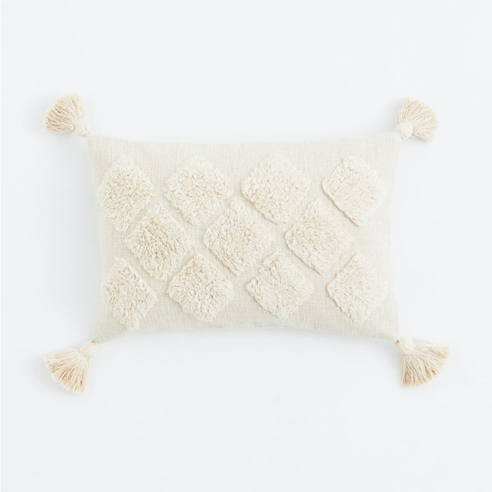 H&M tasseled pillow cover